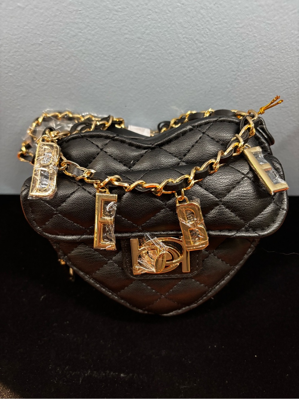 Black Quilted Heart Crossbody Bag with Gold Chain Charms